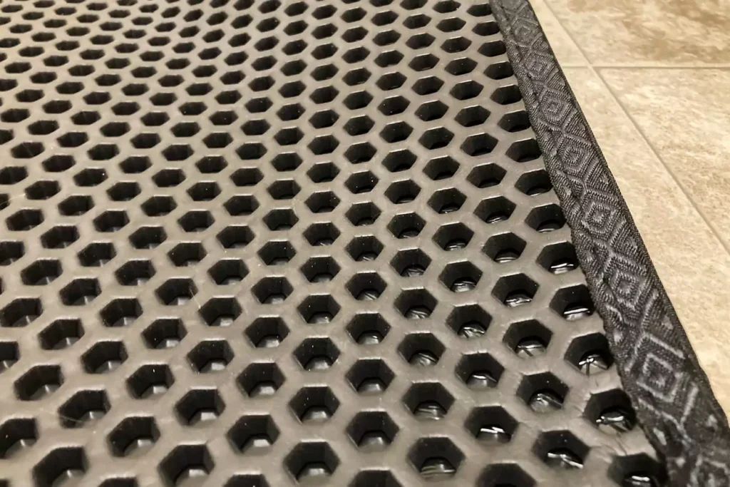 The 7 Best Cat Litter Mats for a Cleaner Home (Tested by Real Cats) 38 iPrimio litter trapper mat with large honeycomb holes to catch stray litter