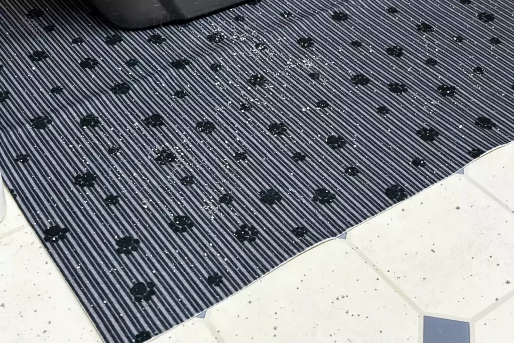 The 7 Best Cat Litter Mats for a Cleaner Home (Tested by Real Cats) 32 Machine-washable Drymate cat litter mat placed on hardwood floor for easy cleanup